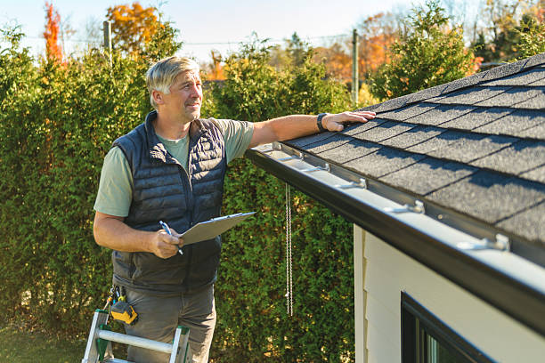 Professional Roofing technician working in Madison, IL
